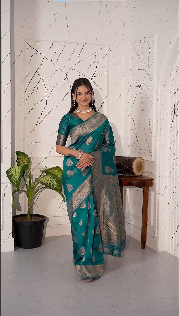Teal green magic silk saree with zari woven border for women
