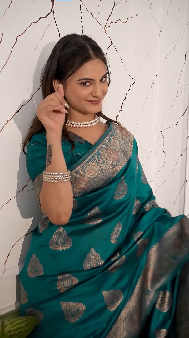 Teal green magic silk saree with zari woven border for women