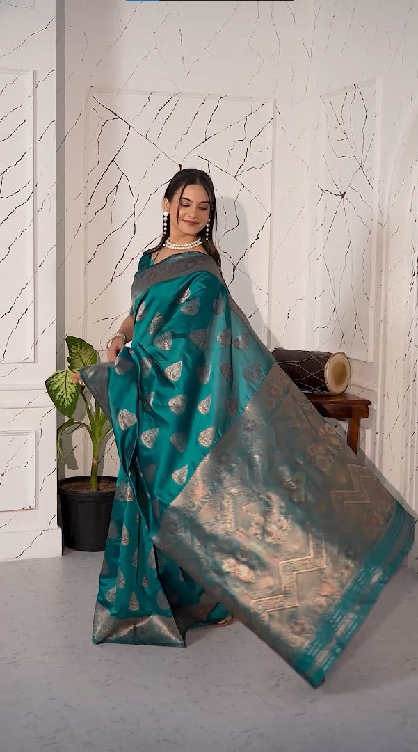 Teal green magic silk saree with zari woven border for women