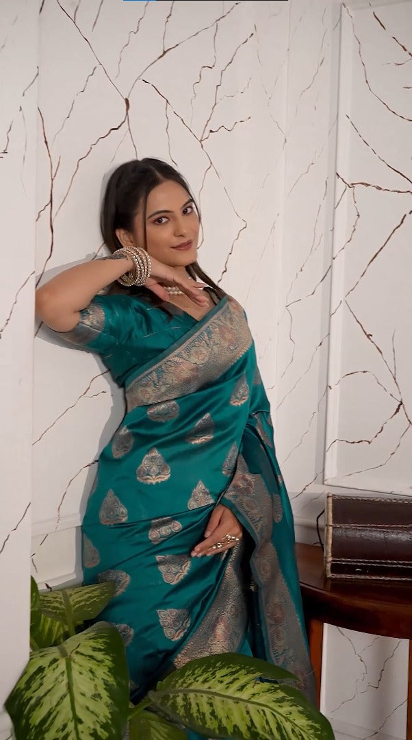 Teal green magic silk saree with zari woven border for women