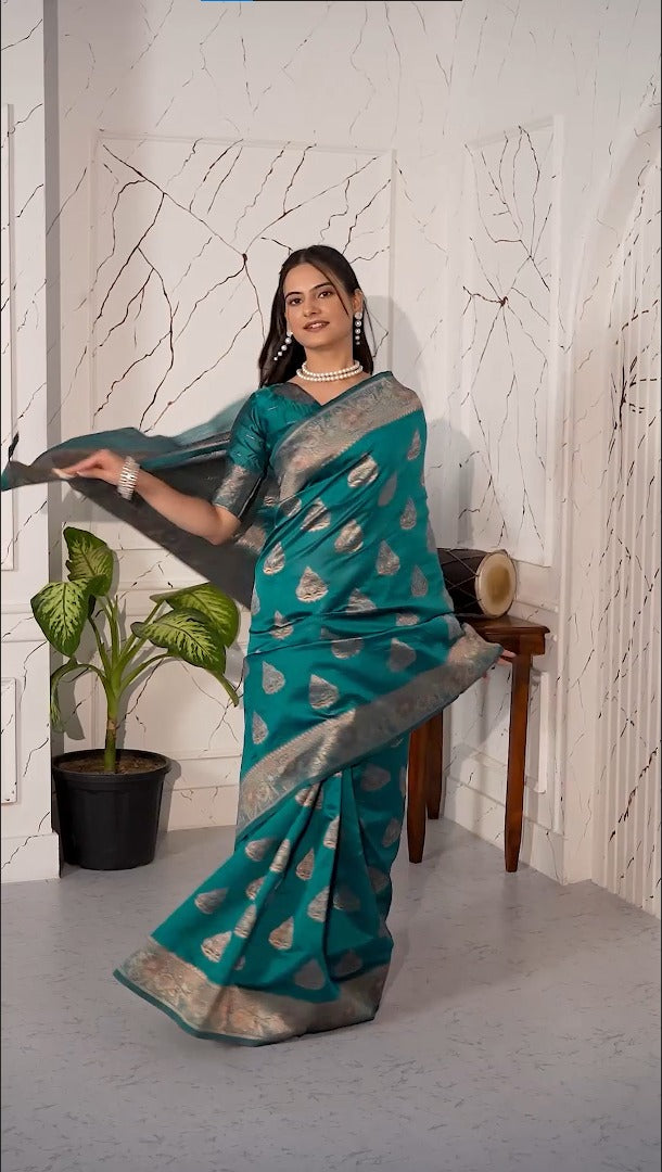 Teal green magic silk saree with zari woven border for women