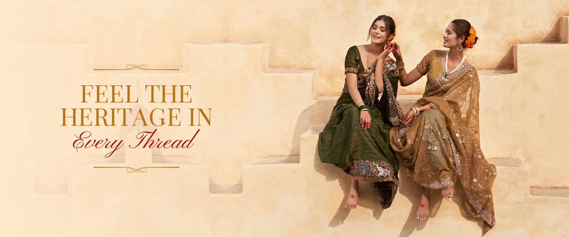 Two women in traditional attire sitting on steps with text about heritage.
