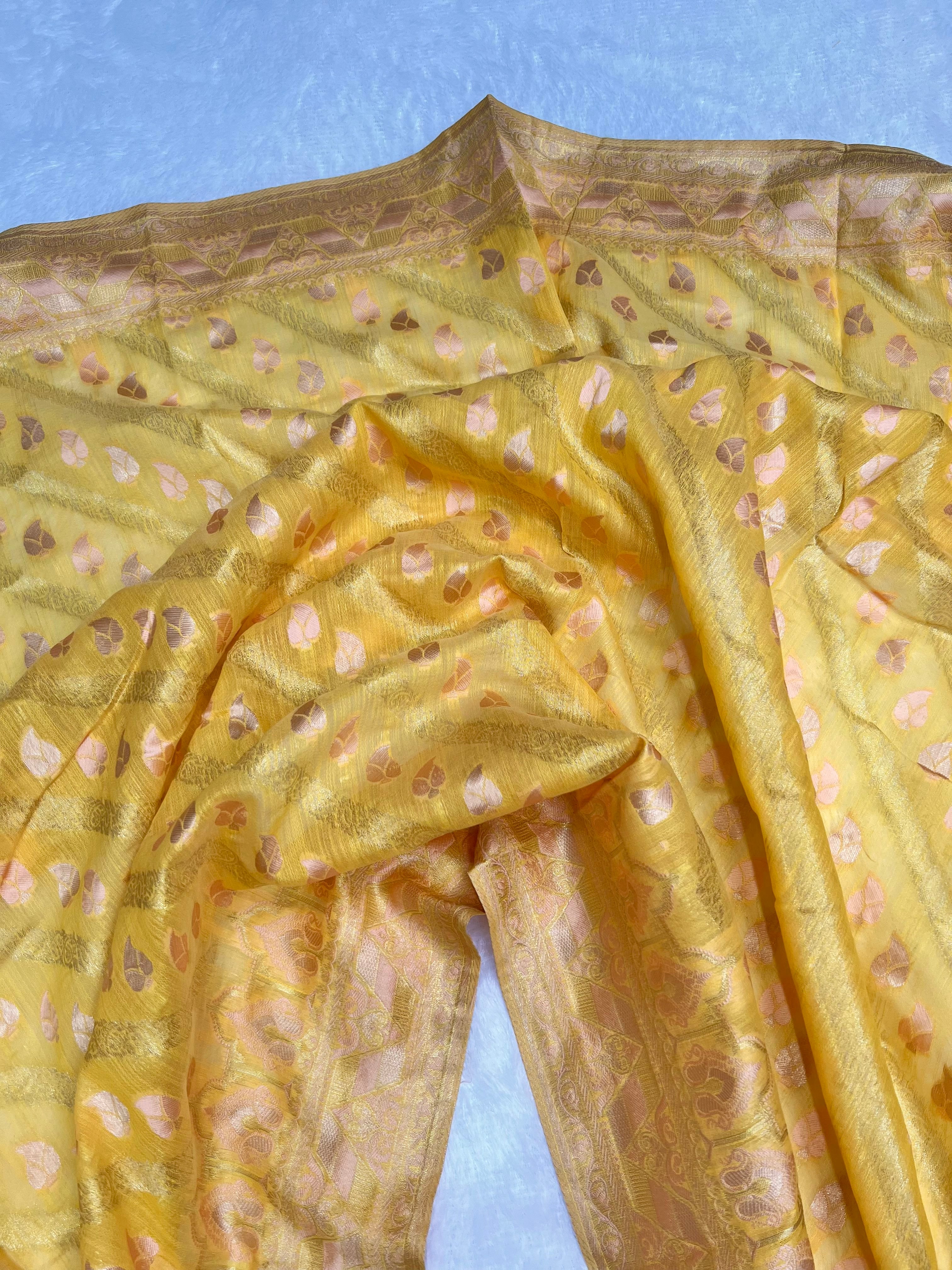 Amolika Banarasi Haldi Wear Yellow Cotton Saree With Unstitched Blouse & Rich Zari Weaving & Tassels