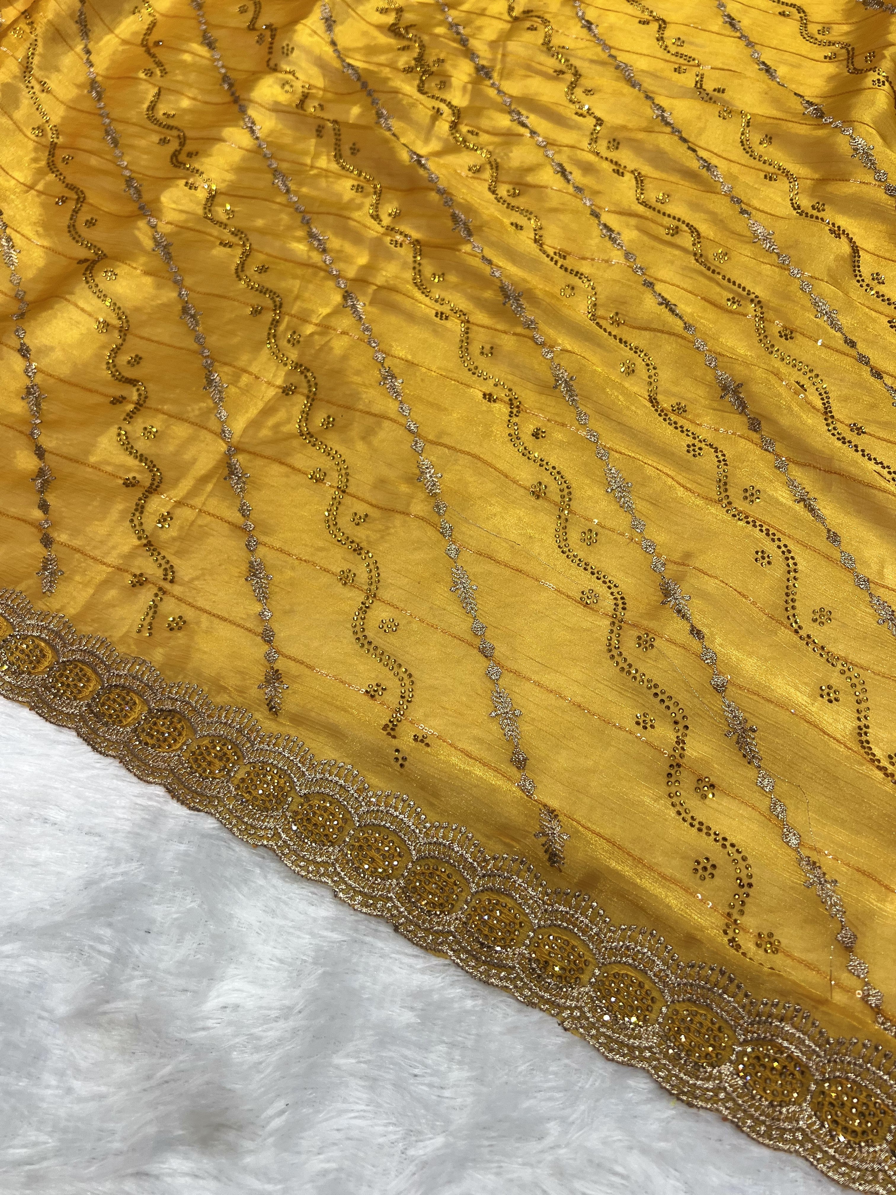 Amolika Sarees Mustard Gold Fancy Chiffon Saree With Heavy Embroidered Zari Border & Stone Work With Unstitched Blouse