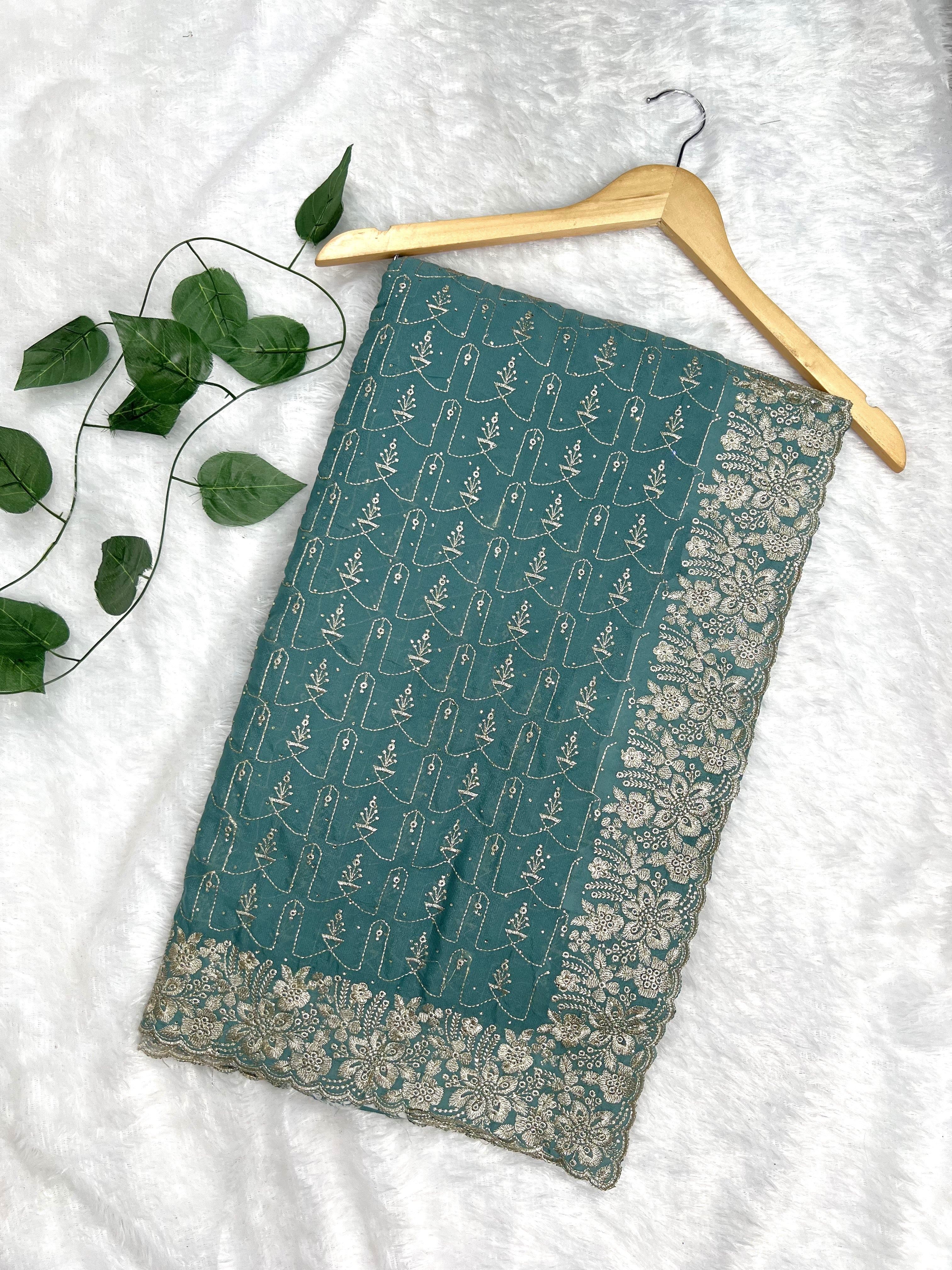 Amolika Designer Soft Silk Saree With Thread Embroidery & Heavy Floral Border (Teal Green | Unstitched Blouse)