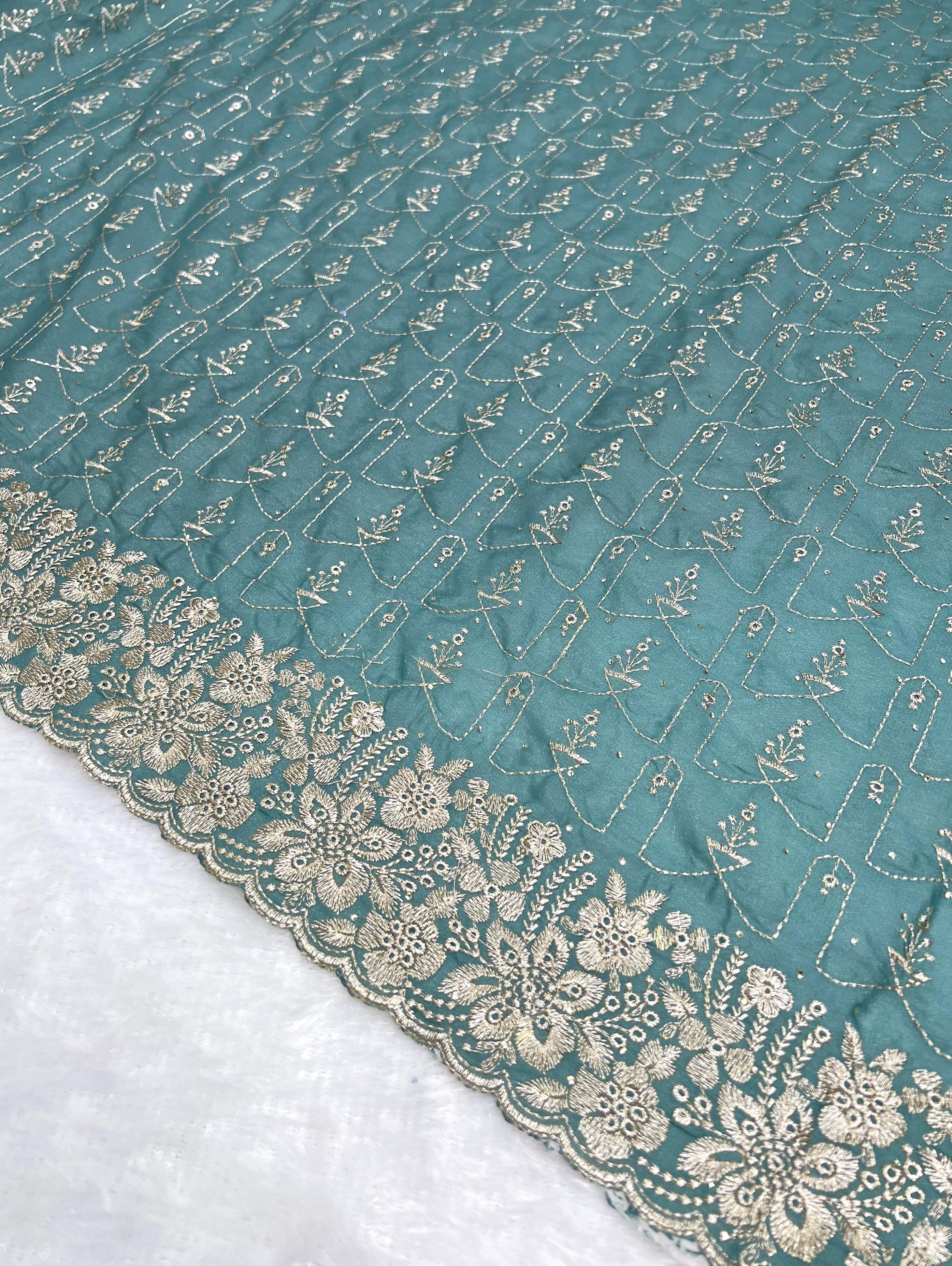 Amolika Designer Soft Silk Saree With Thread Embroidery & Heavy Floral Border (Teal Green | Unstitched Blouse)